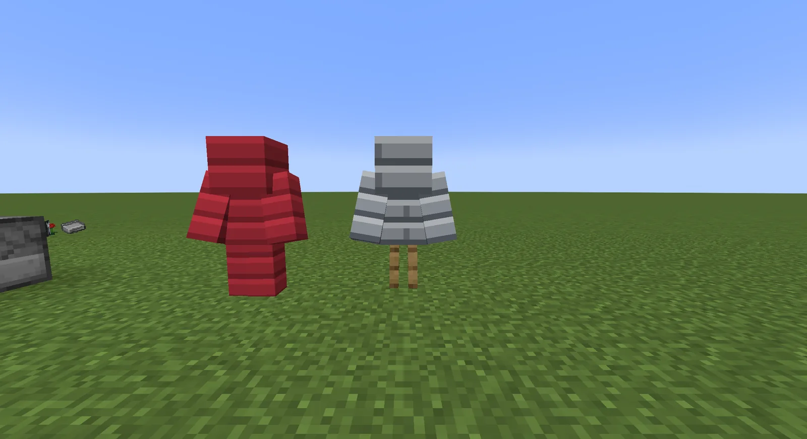 Two sets of armour on stands