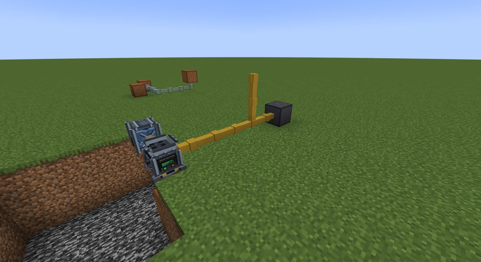 Machines joined by cables and a fluid pipe